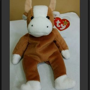 Original Bessie beanie baby with errors in tag… in almost mint condition